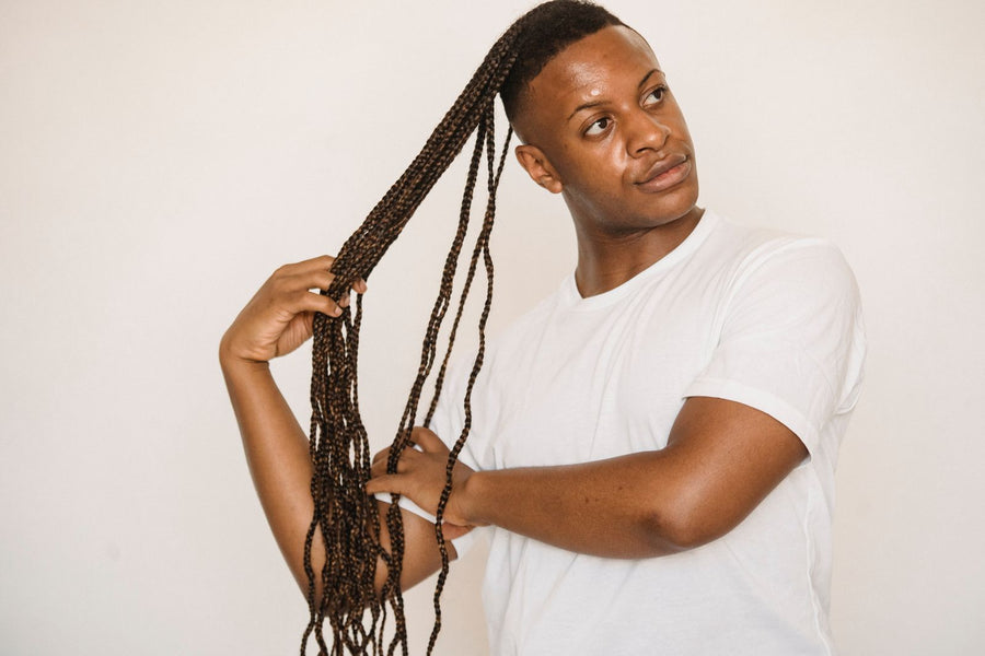 Long braids swept into a high ponytail