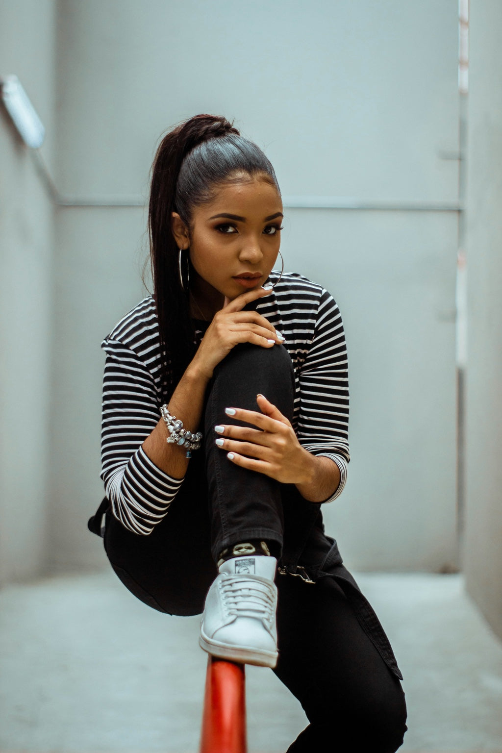 Virgin Hair Bundles style inspiration: long sleek ponytail with hoop earrings